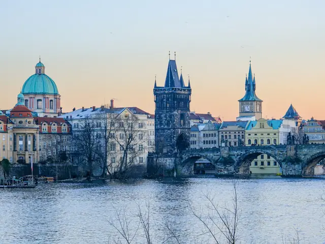 Charles Bridge and its tower across the river in Prague