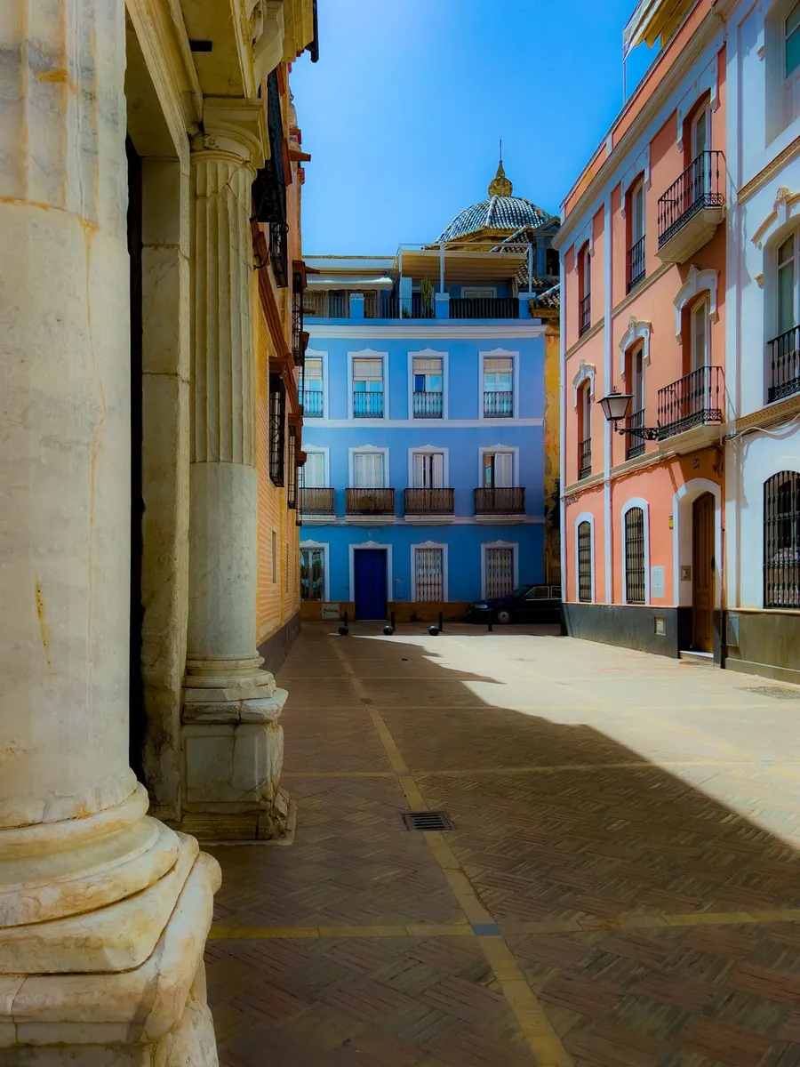 A blue house on a quiet square in Seville