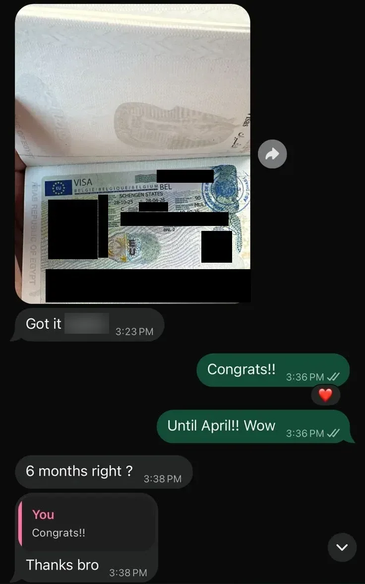 A client's multiple-entry Schengen visa in a passport, sent to us on WhatsApp, with the face, name and numbers covered
